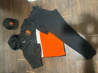 Oriole’s pullover size medium, Ua joggers size m , oriole’s trucker cap adjustable