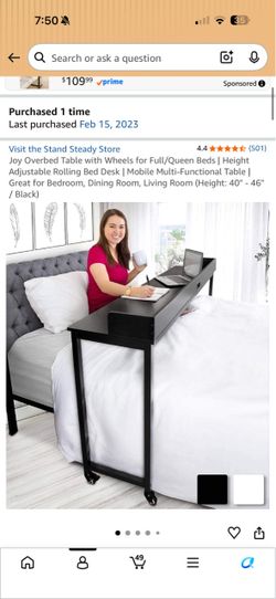 Black standing desk on wheels
