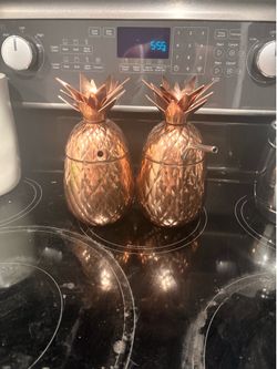 Two pier one imports copper pineapple mugs