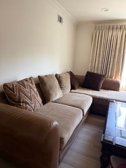 Large L-Shaped Sectional Sofa with Pillows