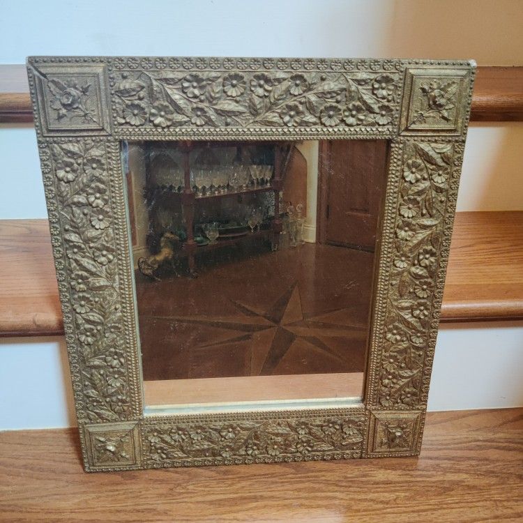 ORNATE ANTIQUE MIRROR