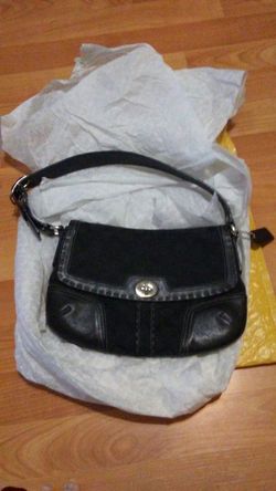 Black coach shoulder bag, handbag. Trimmed with genuine leather