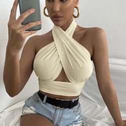 Solid cross crop halter top (cream color)