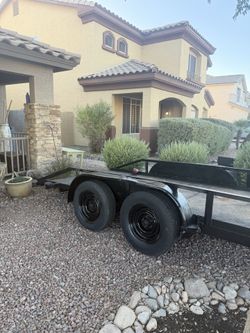 Trailer 15 1/2 feet long by 6’4” wide Diamond plate. Dual axle with ramps.