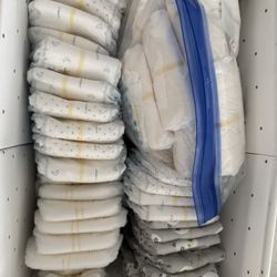 Newborn, size 1 & 2 pampers, Huggies, coterie, honest, Kirkland, mama bear - 218 diapers