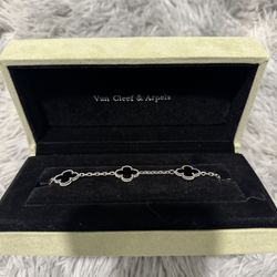 silver and black bracelet 