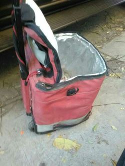 Rolling lunch box with pull out handle and big pull out storage area