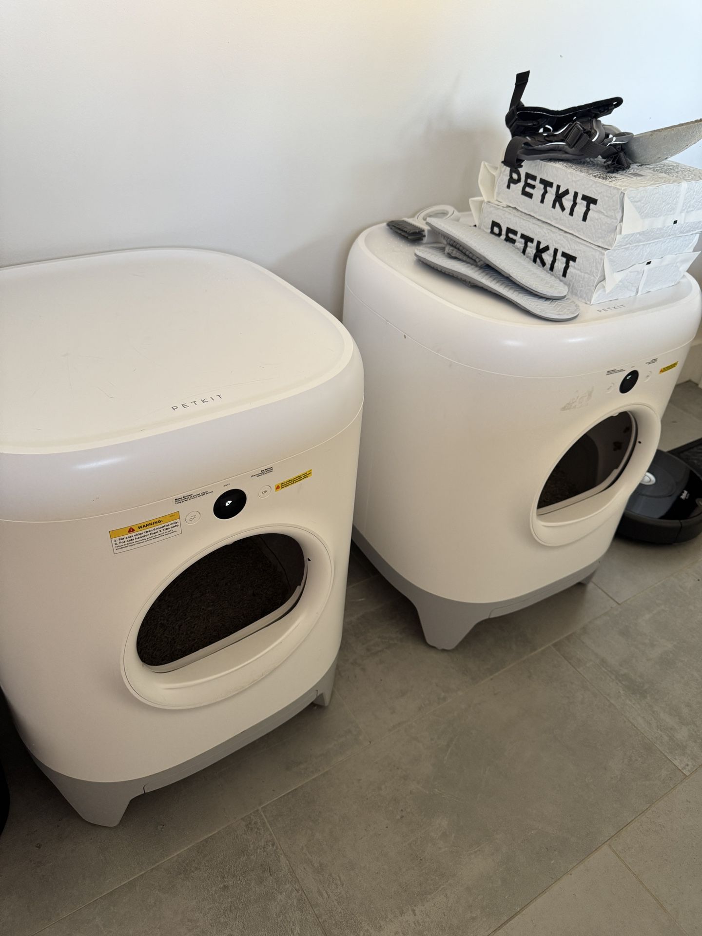 2 PETKIT Self-Cleaning Litter Boxes + 2 Bags of Cat Litter