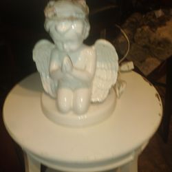 Cherub lamp a table $45 firm price ,local people fcfs
