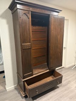 Antique Dark Wood Armoire with Drawers