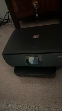 HP ENVY 5643 Printer/ Black / 17.5 inches wide, 13.2 inches deep, and 4.7 inches high, with a weight of about 12.3 pounds.