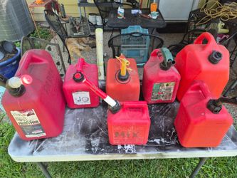 Nice Used 7 gasoline cans.