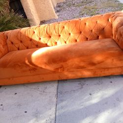 Gold Tufted sofa