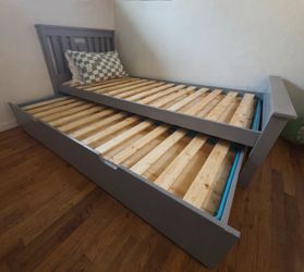 Twin bed frame with trundle