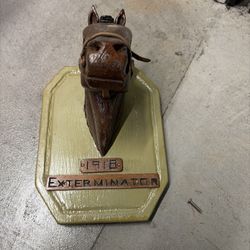 Vintage bust of the Exterminator racehorse from 1918. The winner of the Kentucky Derby, the legendary “Old Bones". Handmade on a wooden stand