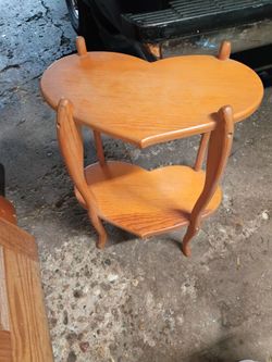 Said table made of wood 🪵 18"wx 25h x 10" deep