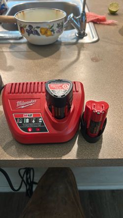 M12 charger + 2 m12 batteries