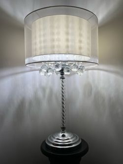 Lamp and silver table