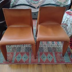 MID CENTURY LEATHER CHAIRS ( SOLD AS IS  )