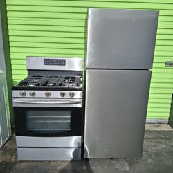 Refrigerator and a stove, both for $9.50. The stove is 30 inches wide and runs on gas.