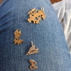 Four 14 Kt Gold  Charms