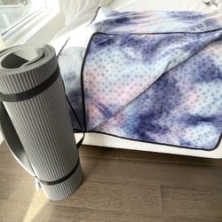 $14 Gaiam Essentials yoga mat, $12 yoga towel