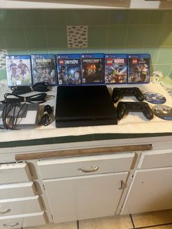 Sony PS4 Slim CUH-2215B Console w/ 2 Controllers,8 Games, Lego Portal and Cables