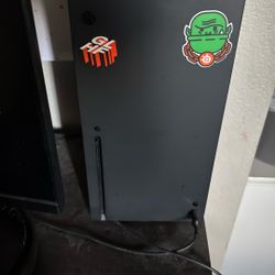 Series X Monitor And Two Controllers