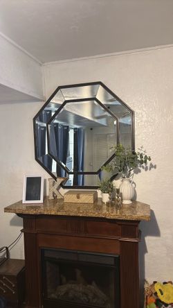 Huge, heavy octagonal mirror.