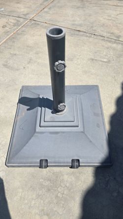 $40 BIG UMBRELLA STAND VERY HEAVY