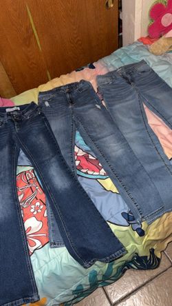 8 pairs of girl jeans size 14 $55