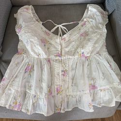 Beautiful flower Easter blouse asking $10