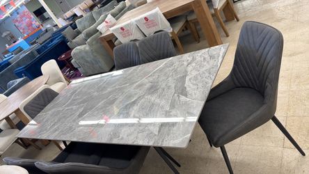 Dining table with marble top