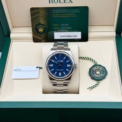 Brand New 2025 Rolex Oyster Perpetual 41mm 134300 Blue Dial Smooth Bezel Steel Oyster Full Set Box Card Tags Booklets