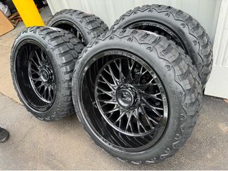 NEW 22x12 gloss black fittipaldi wheels wrapped in 33x12.50r22 RBP tires