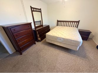Brown wood Bassett Queen Bedroom set