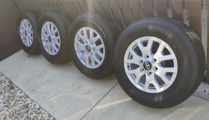 17" TOYOTA TACOMA WHEELS /RIMS, 17 X7 ALLOY 6V SPOKE SILVER FACTORY OEM, TOYO H/T 245 70 17