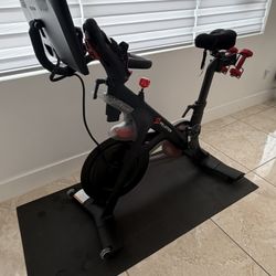 Peloton Bike – Excellent Condition + Mat + 4 lb Weights + Comfort Seat (Ready to Ride)