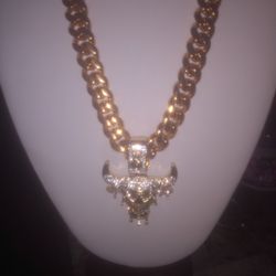 A Cuban Link Chain With Cz Diamonds With Bulls Symbol With Added Drip $150