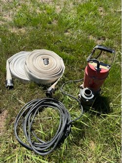 MultiQuip 2” submersible trash pump with 100’ of discharge hose