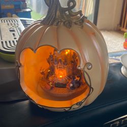 A Vintage Lighted Pumpkin With Disney Character S