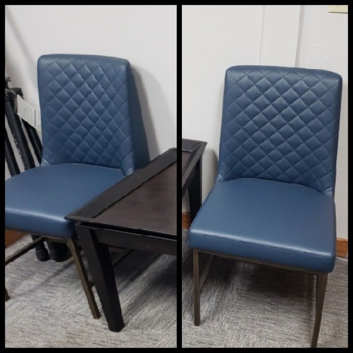 Two blue cushioned chairs, for home or office