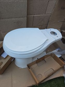 Used glacier bay toilet