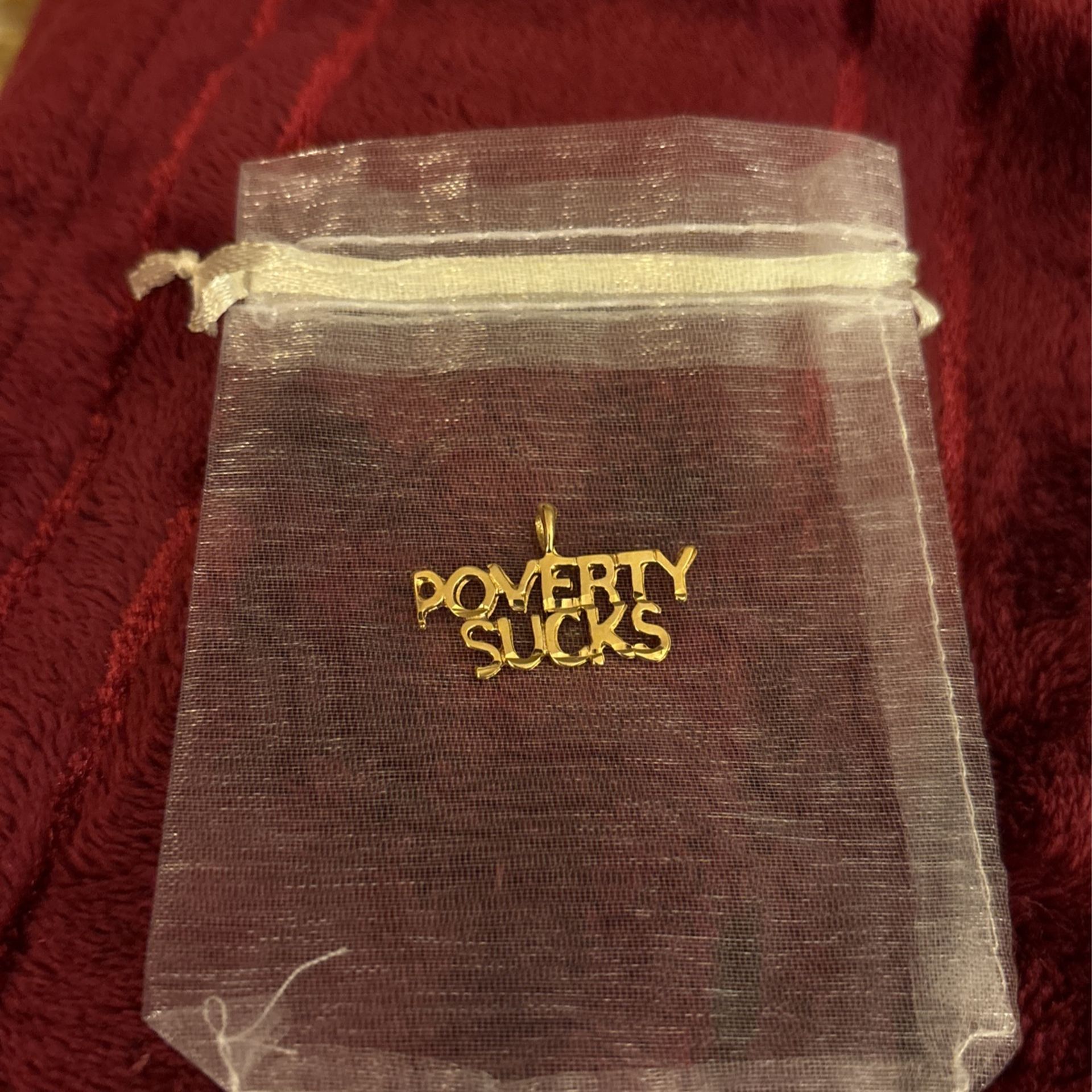Vintage Gold Plated Pendant “ Poverty Sucks “