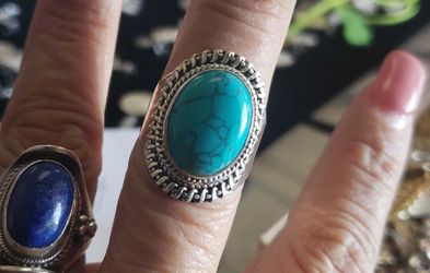 Turquoise silver ring only.
