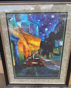 Large print and frame of Vincent van Gogh's famous painting, "Café Terrace at Night