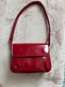 Red vinyl shoulder purse