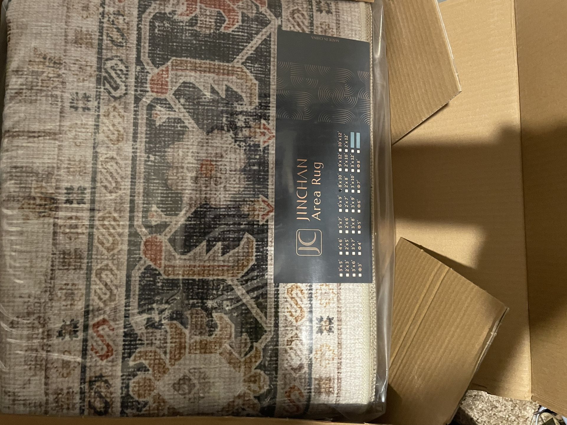 Jin Chan Area Rug