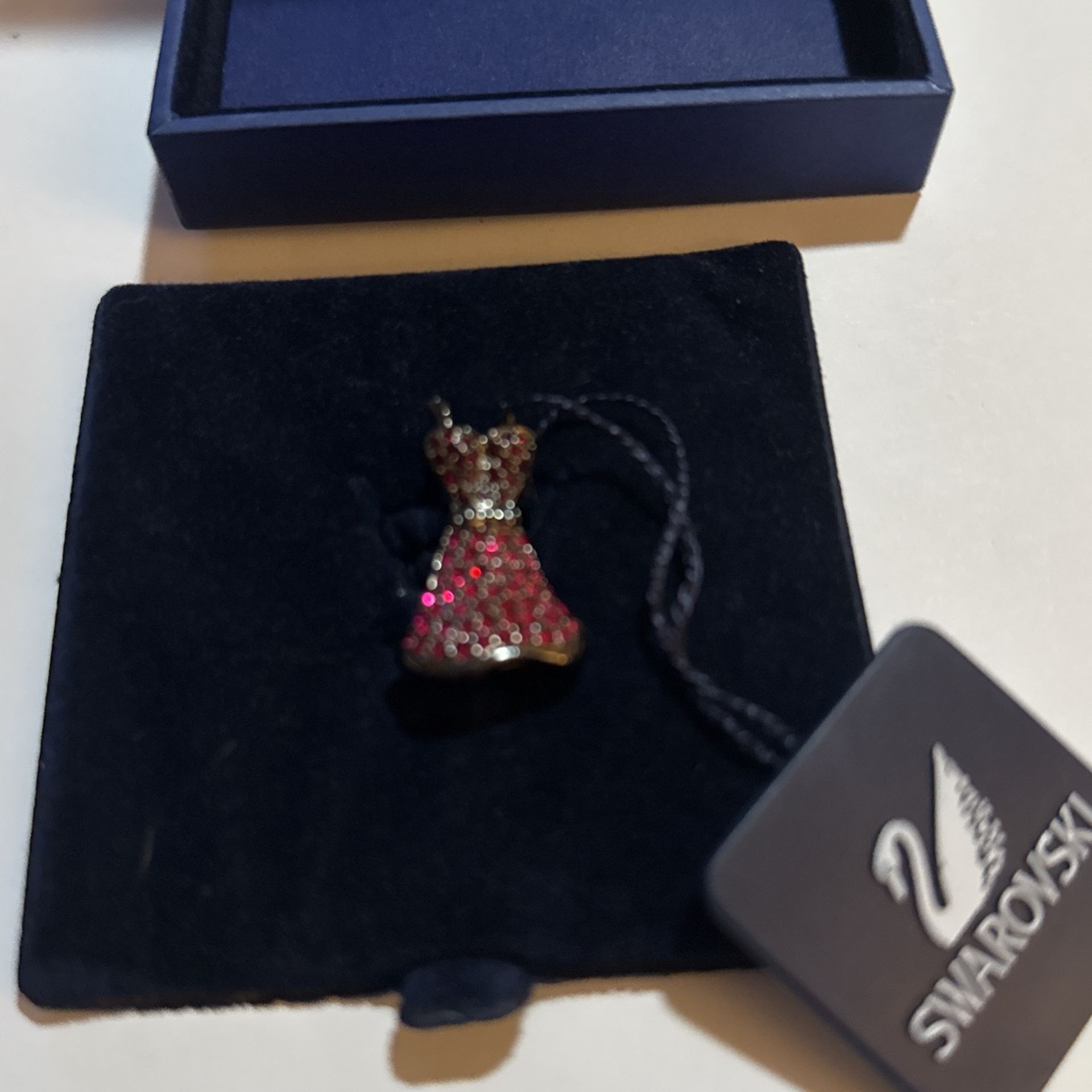 Swarovski Red dress Pin In Original Box With tag