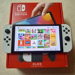 NINTENDO SWITCH OLED MOD with 100 SWITCH GAMES and 7000 CLASSIC ARCADE GAMES INCLUDED